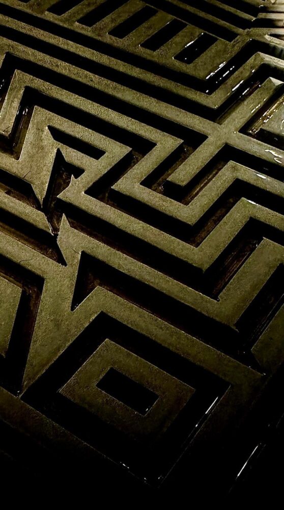 Labyrinth pattern cut steel, close up