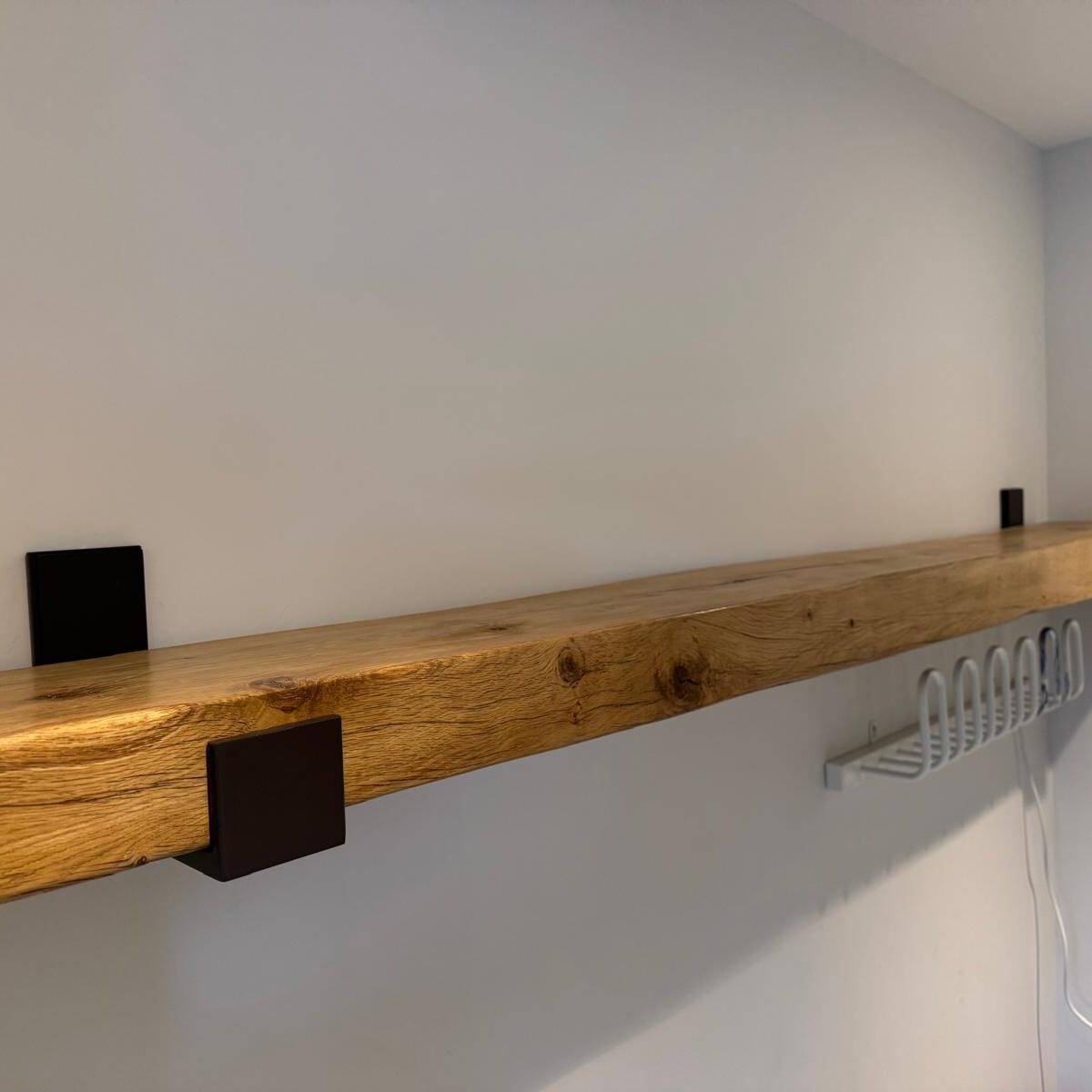Oak floating shelf with bespoke steel brackets
