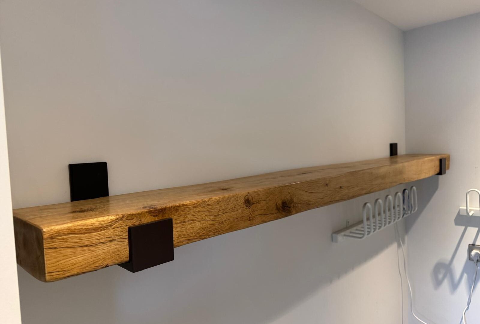 Oak floating shelf with bespoke steel brackets